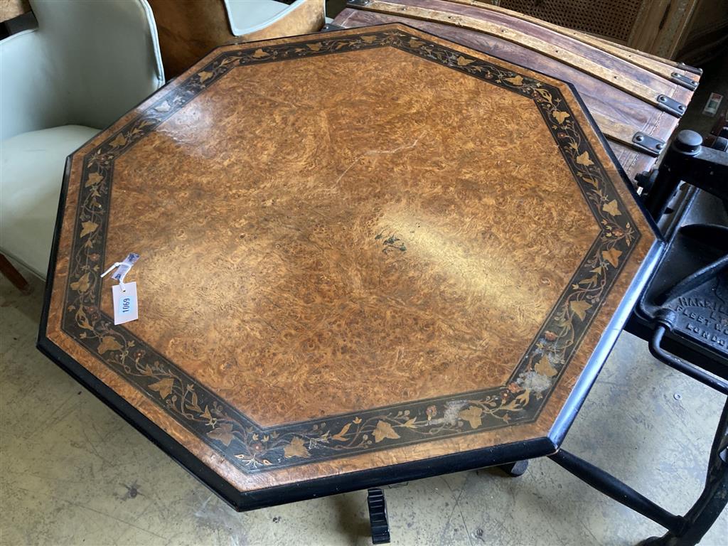 In the manner of Lamb of Manchester. An octagonal amboyna ebonised centre table, bear Southport stamp, width 98cm, depth 98cm, height 7